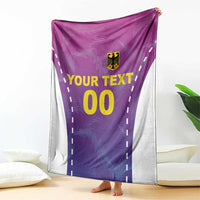 Purple football blanket draped with white trim, yellow “00” and “YOUR TEXT”