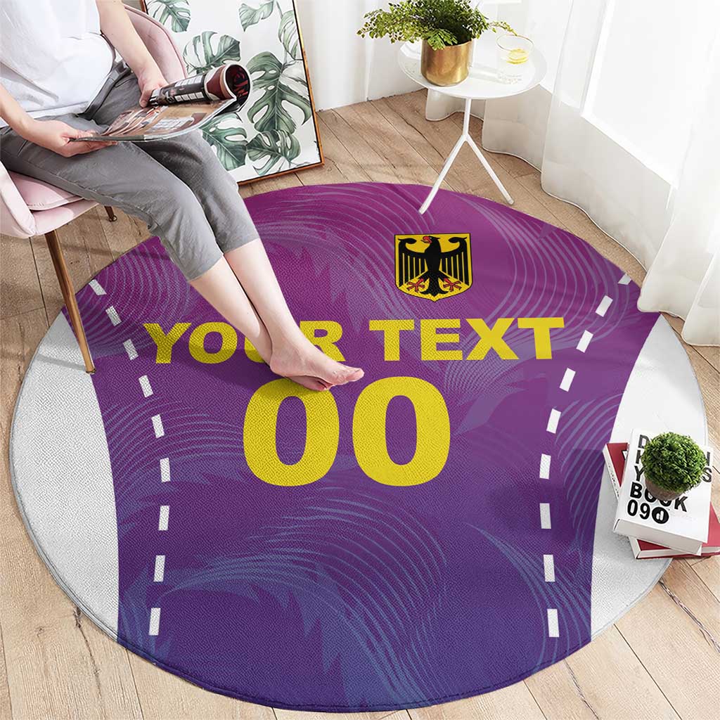 Round purple football carpet with white border, emblem, and 'YOUR TEXT' and '00' print