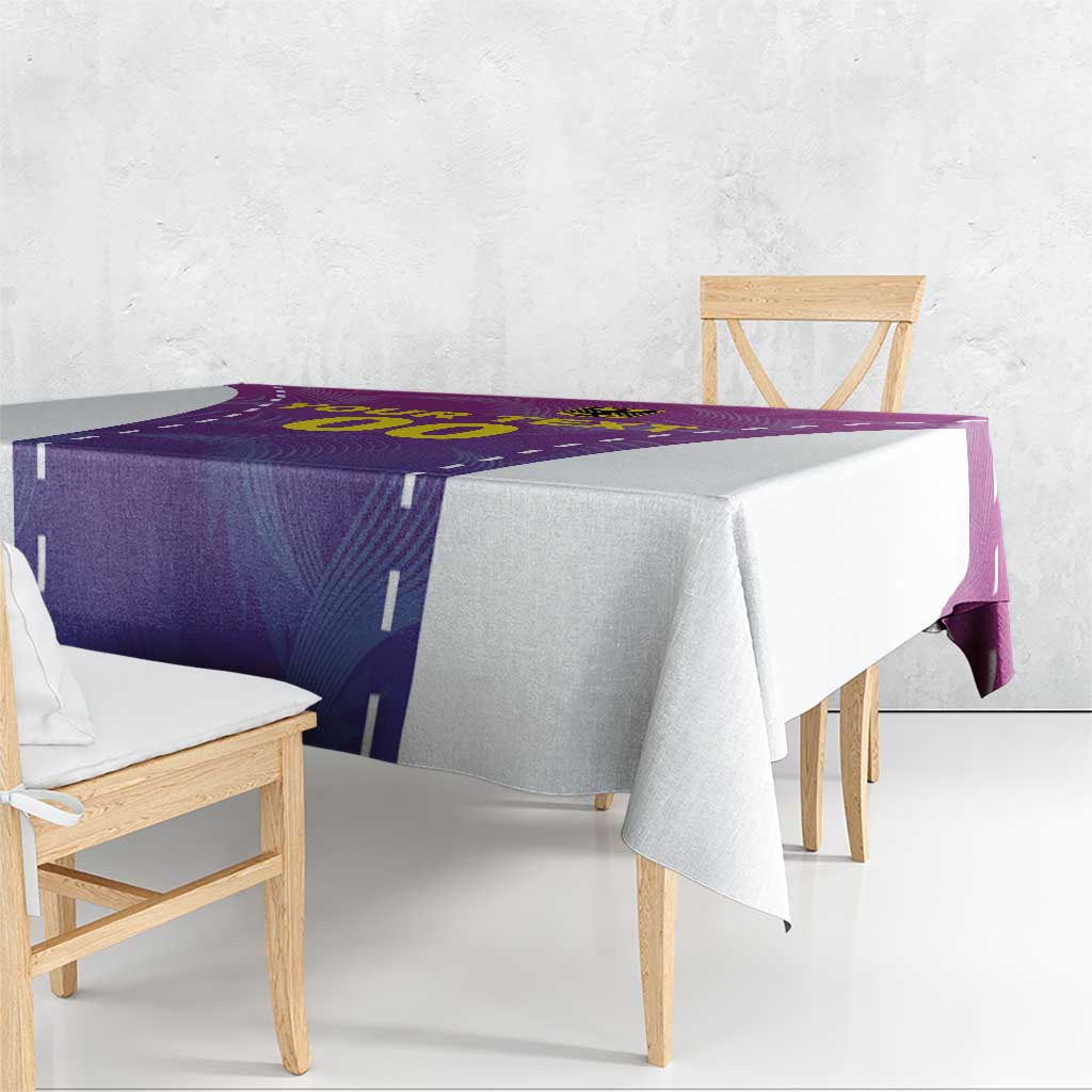 Purple football tablecloth draped on dining table with yellow-and-purple pattern detail