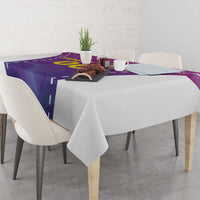Purple custom football tablecloth with yellow graphic, draped on dining table
