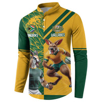 Green and gold button-front rugby sweatshirt with mascot graphic and team crest on chest