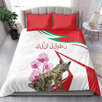 White duvet bedding set with red pillowcases, hyena and pink flowers, green-red stripe motif.