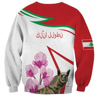 Unisex sweatshirt with red-and-white striped back, Arabic text, pink cyclamen flowers, hyena