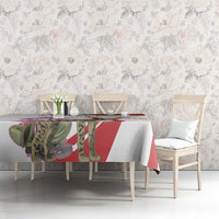 Striped tablecloth with hyena and cyclamen flowers, red, green, and purple on white.