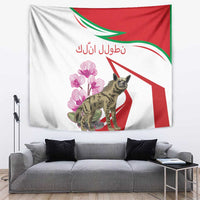 Striped tapestry with tabby hyena, pink cyclamen flowers, Arabic script, and red green accents