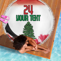 Round beach blanket with fringe displaying “24 YOUR TEXT,” green tree, red chevrons, and pink blooms