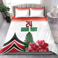 White duvet and pillow set with red trim, "24" Your Text graphic, floral and tree art
