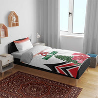 Bedding set on bed frame: white duvet with red-black pattern, 24 Your Text and tree