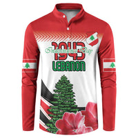 Red button sweatshirt with white front graphic featuring Lebanon emblem, tree and flowers.
