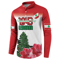 Red button sweatshirt with white front graphic, Independence Day Lebanon text and flowers.