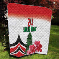 Red and white quilt with 24 YOUR TEXT, pine tree and pink flowers, corner view