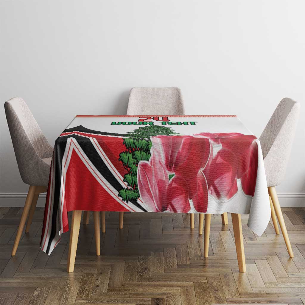 Red floral tablecloth featuring pine tree and bold chevron stripe design