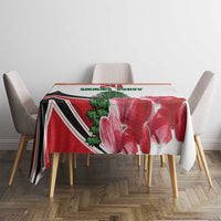 Red floral tablecloth featuring pine tree and bold chevron stripe design