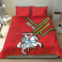 Red bedding set with two pillows and knight-on-horse coat of arms print in bold colors