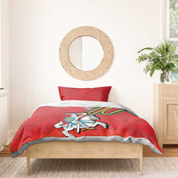 Red duvet cover with knight on horse and coat of arms graphic, styled with two pillows