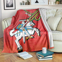 Red coat of arms blanket with mounted knight and striped banner graphic