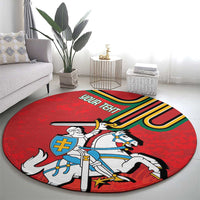 Red round carpet with knight holding a spear and a horse with coat-of-arms details