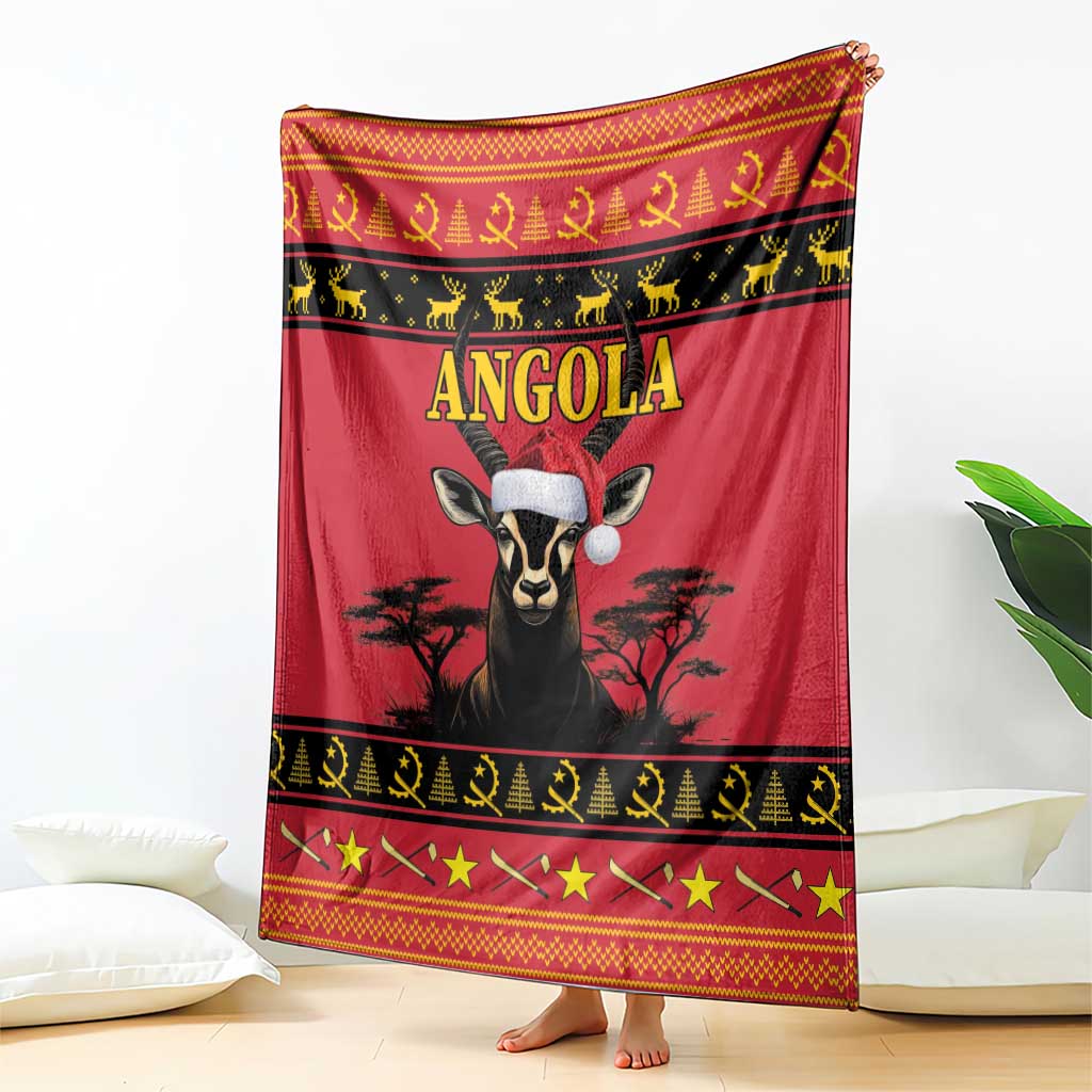 Red Angola blanket featuring antelope portrait, black animal silhouettes, and gold stripes
