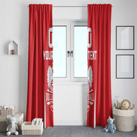 Red volleyball curtains with custom “YOUR TEXT” and white crest on each panel.