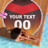 Round beach blanket with white fringe, “YOUR TEXT 00” on red black orange chevrons