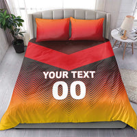 Duvet bedding set with two red pillows; orange chevron pattern and "YOUR TEXT 00".