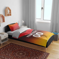 Bed bedding set with red pillows; duvet shows chevrons and "YOUR TEXT 00" lettering.