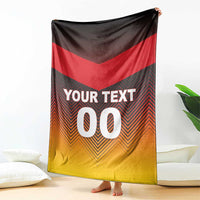Germany football blanket with red, black, and gold chevron pattern and bold 00 text