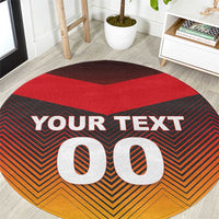 Round football-style carpet, red top, black and orange zigzag, bold custom text