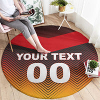 Round football-style carpet, red center, black and orange chevrons, YOUR TEXT with big 00