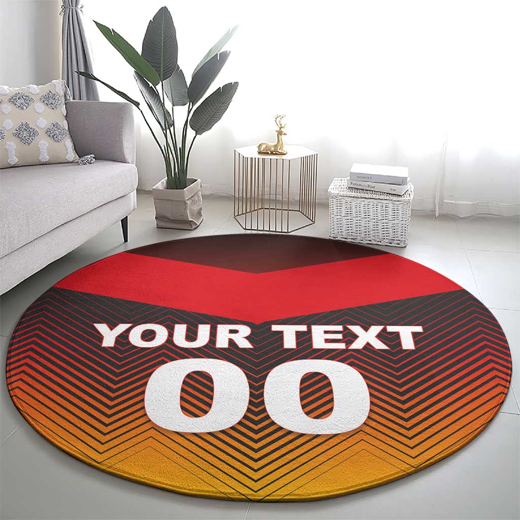 Round football-style carpet, red center, black and orange zigzag, YOUR TEXT and big 00