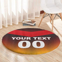 Round football-style carpet, red center, black and orange zigzag, YOUR TEXT with big 00