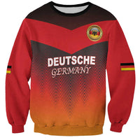 Red crewneck football sweatshirt with DEUTSCHE GERMAN zigzag flag graphic and crest patch.