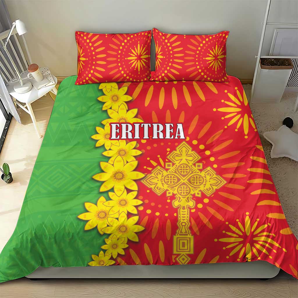 Comforter and pillow set with green field, red side panels, yellow floral and ERITREA lettering