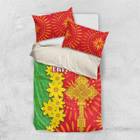 Folded bedding set: green comforter with yellow flowers and red pillows in Eritrean folk style