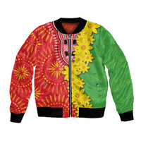 Unisex bomber jacket with red and green folk floral pattern, yellow details, black trim