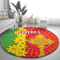 Round folk-pattern carpet featuring ERITREA text, yellow flowers, and red geometric motif