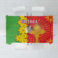 Folk-pattern tablecloth with red, green, and yellow floral and geometric print