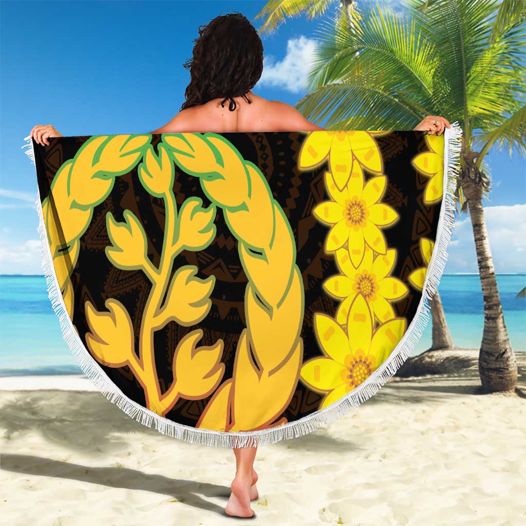 Round beach blanket with fringe, yellow floral and green tree coat-of-arms on dark background