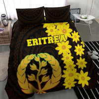 Black duvet with two pillows; large yellow flower cluster and coat-of-arms emblem, “ERITREA”