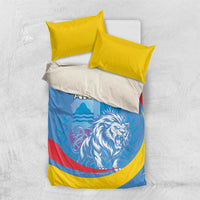 Aruba bedding set with two yellow pillows: blue duvet shows roaring lion and ARUBA lettering