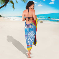 Blue Aruba lion sarong with 'ARUBA' text and multicolor edge panels, wrap towel