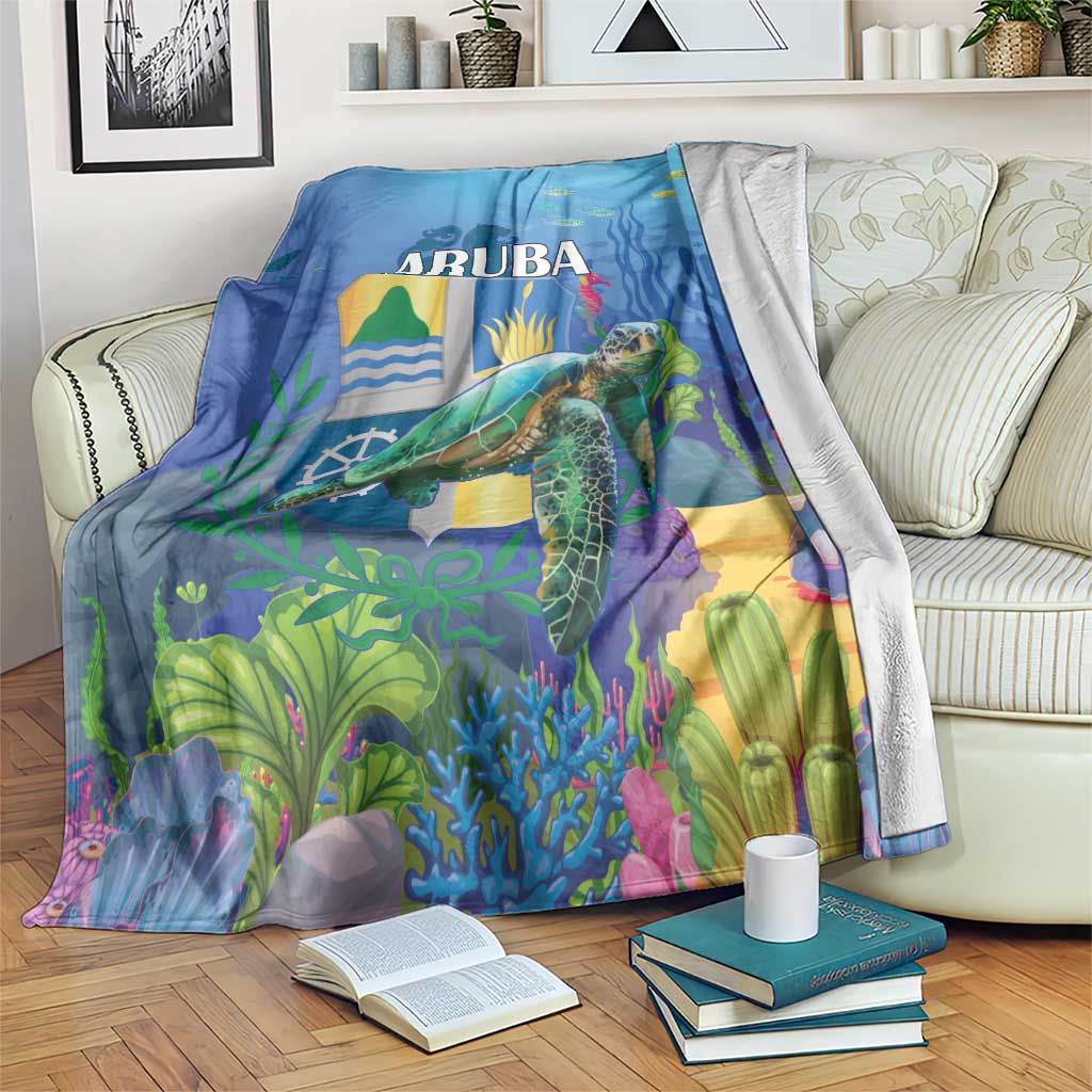 Blue sea turtle beach blanket with ARUBA text and underwater coral illustration