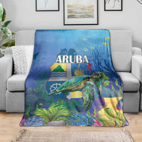 Blue sea turtle blanket with ARUBA text and underwater reef scene