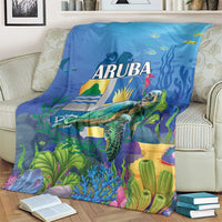 Blue ARUBA sea turtle blanket with underwater plants, coral, and waves