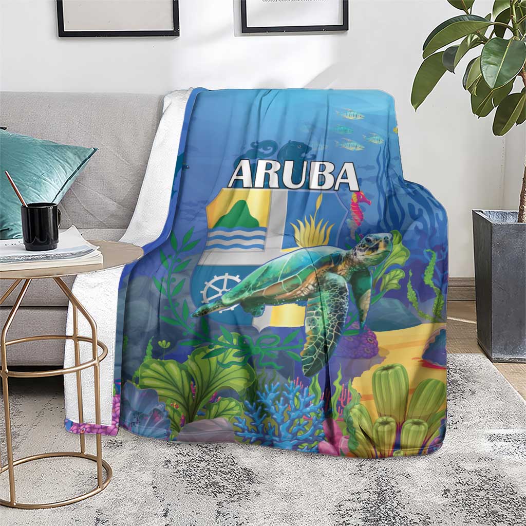 Blue sea turtle blanket with ARUBA text and colorful island landscape