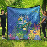 Blue quilt with sea turtle and coral underwater scene, quilted diamonds, ARUBA text