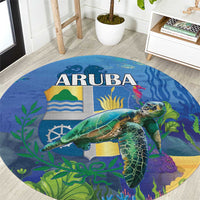Round blue sea turtle rug with ARUBA text and underwater waves, plants, and coral