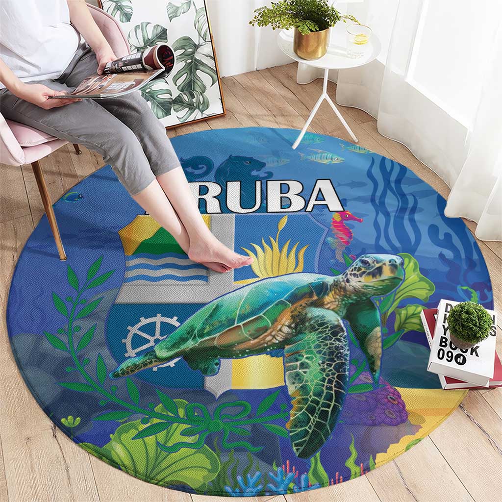 Round blue sea turtle rug showing large turtle and ARUBA lettering in center