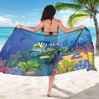 Blue sarong with Aruba logo and colorful coral reef sea turtle print