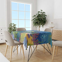Blue sea turtle tablecloth on table with underwater reef, fish, and plant illustration